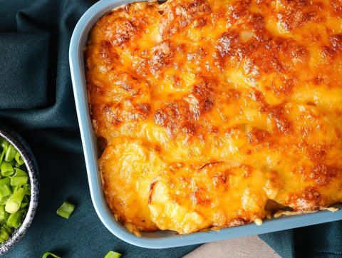 Don't make ordinary mashed potatoes . . . make a cheesy potato casserole!