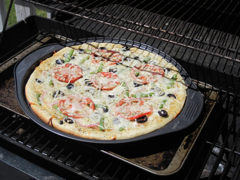 Focaccia baking on a grill